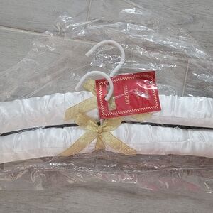 New Sealed, Mary Kay White Padded Hangers Angel Fire (2 per package). 4 Availabl
